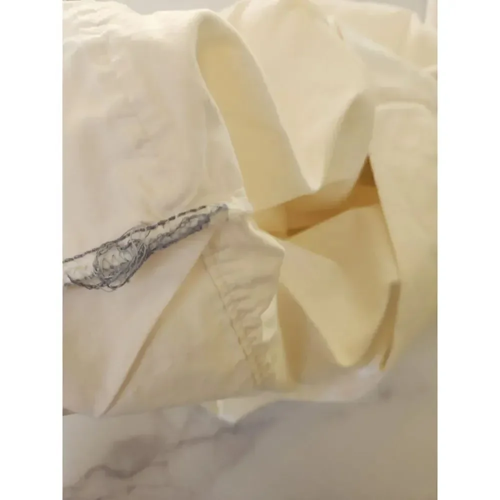 JcPenny home twin flat sheet cream and 1 swiss dot textured pillowcase sham